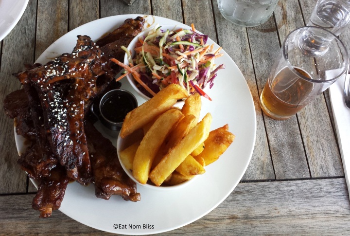 A giant stack of ribs served with homemade smoked barbeque sauce, hand cut fries, coleslaw. This for $20, was worth it.